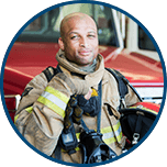 Firefighter in front of truck