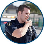 EMT speaking into shoulder radio