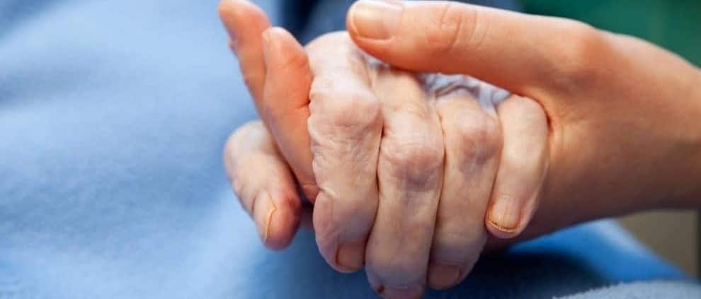 Close up of two hands holding