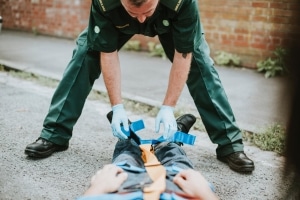 EMT rescuing patient