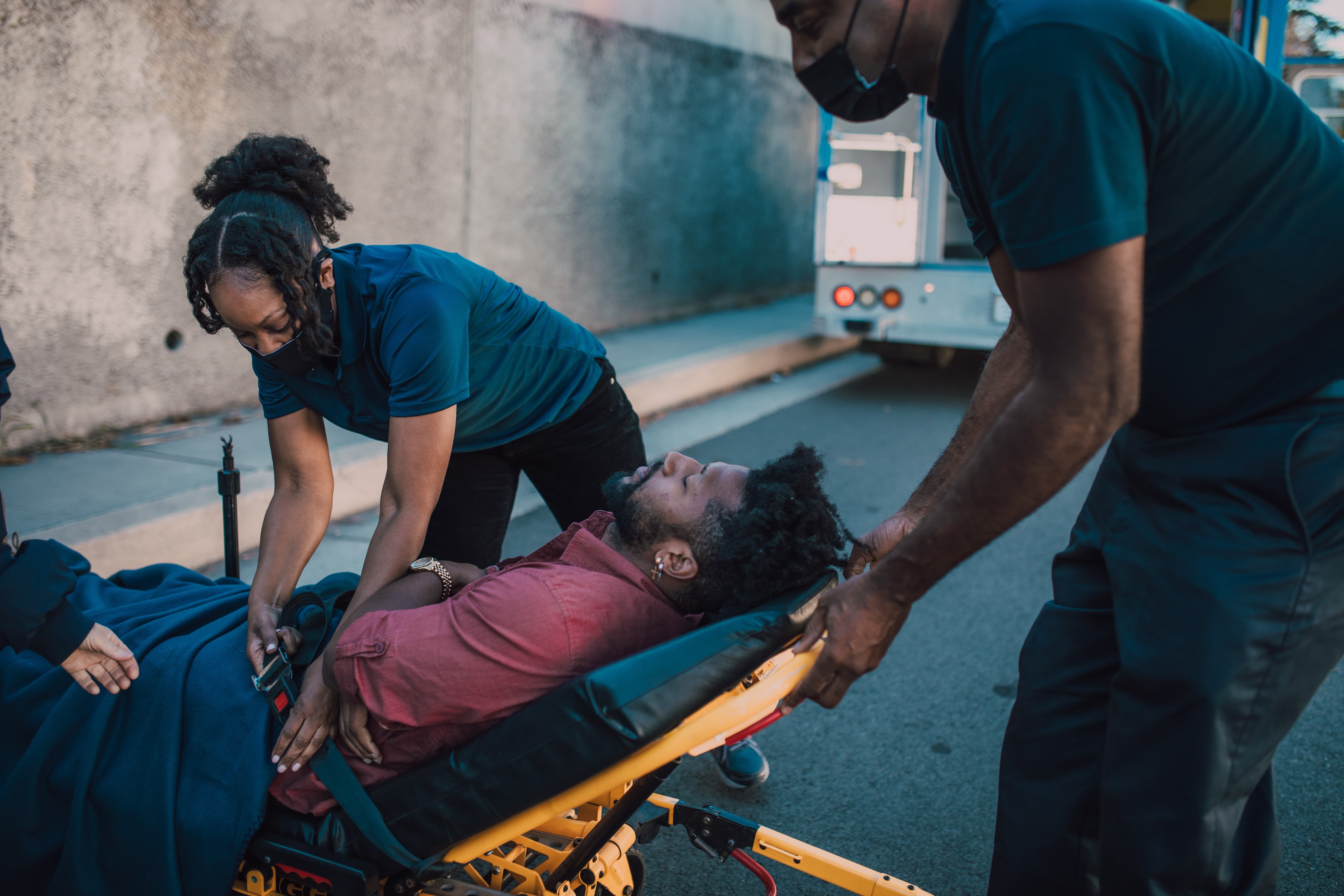 EMS team transporting a patient