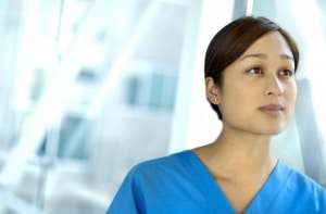 Female healthcare worker looking away