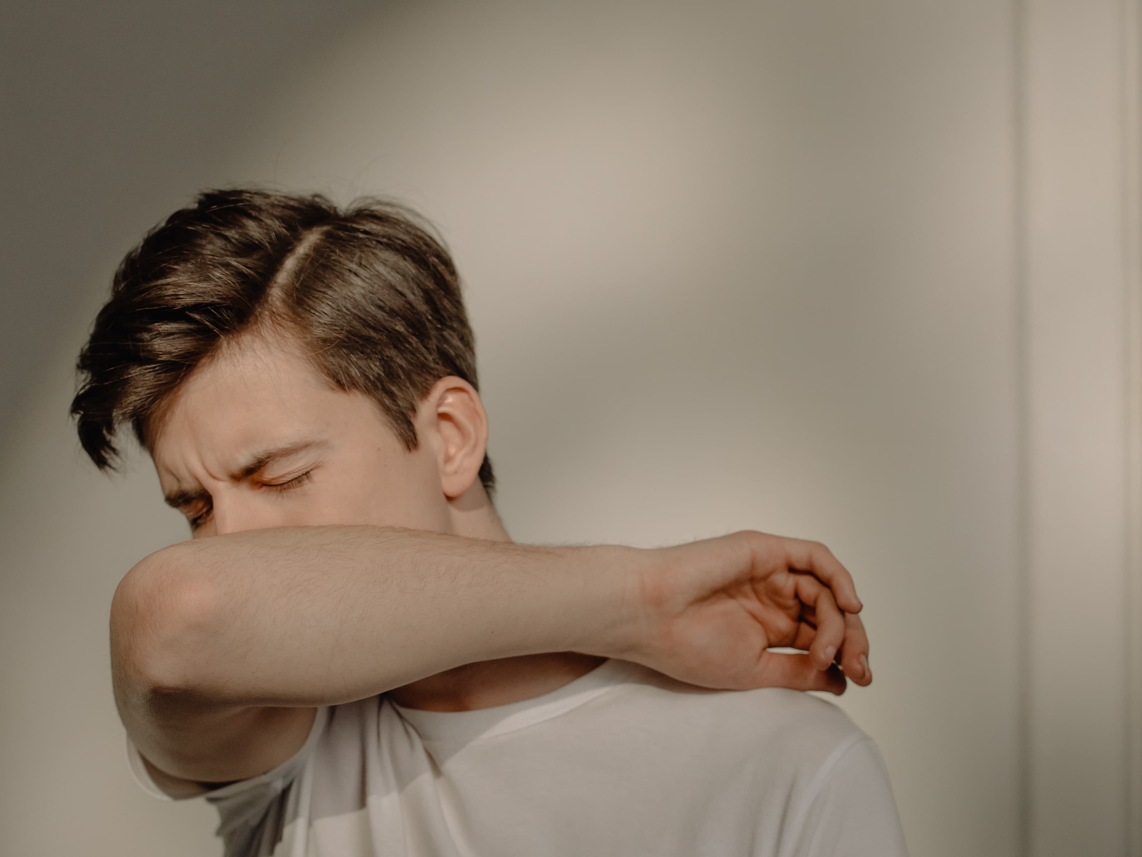 Fatigued man feeling unwell