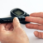 Diabetic person testing their blood sugar levels