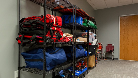 EMT boot camp course storage racks with supplies