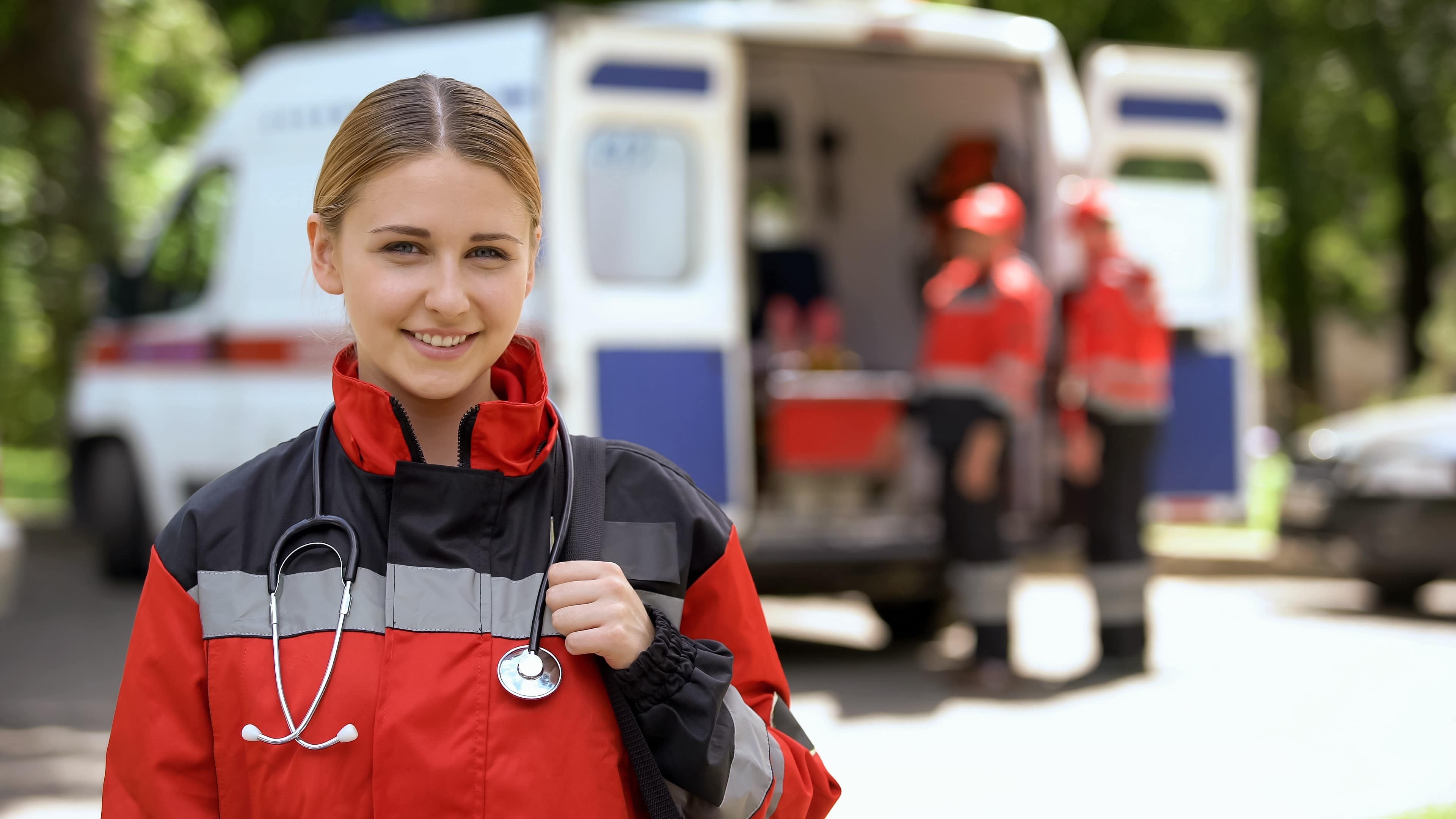 Smiling female paramedic