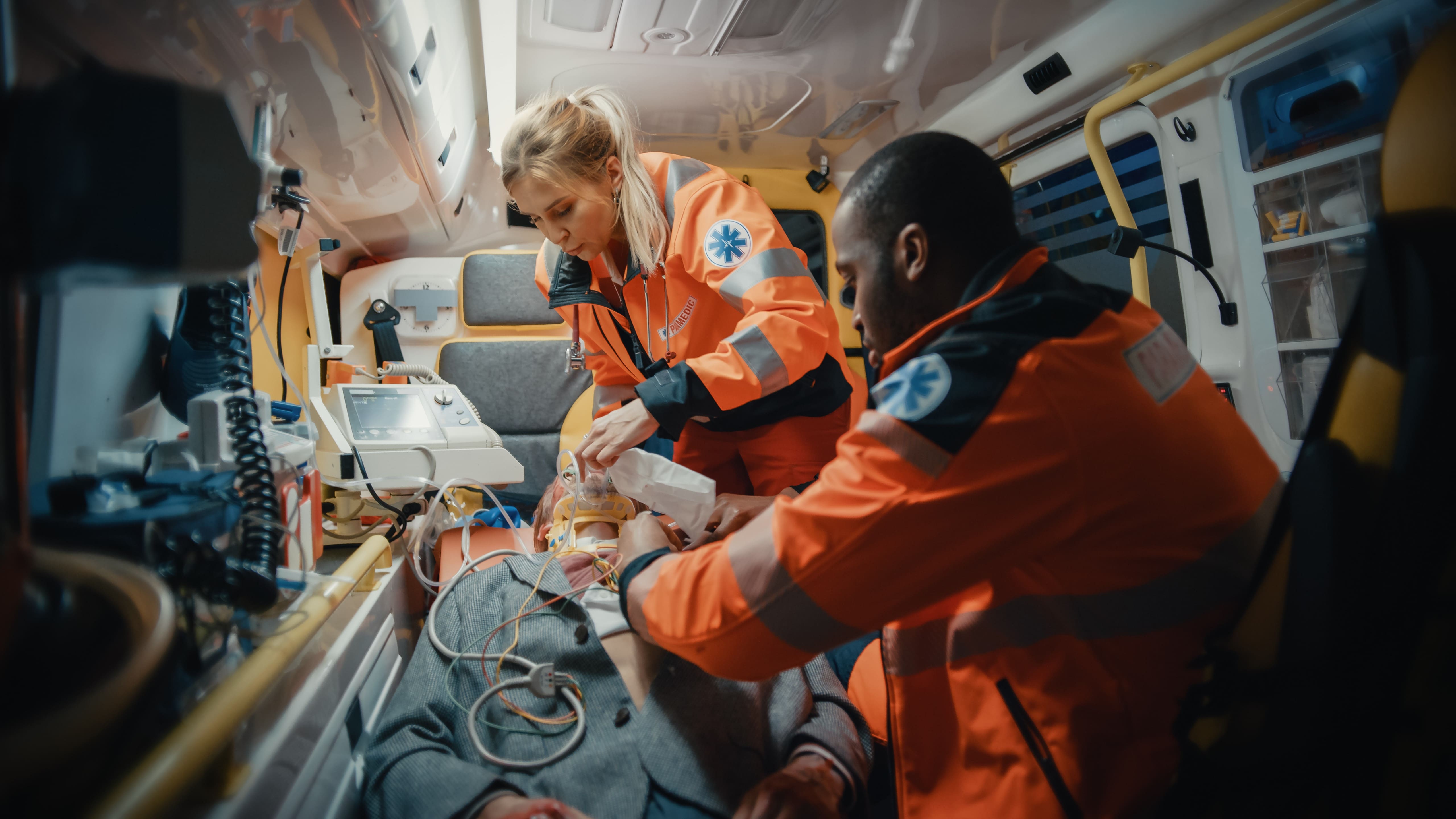 Paramedics at work in an ambulance