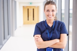 Female healthcare professional in a hallway
