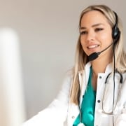 Smiling dispatcher with a headset on