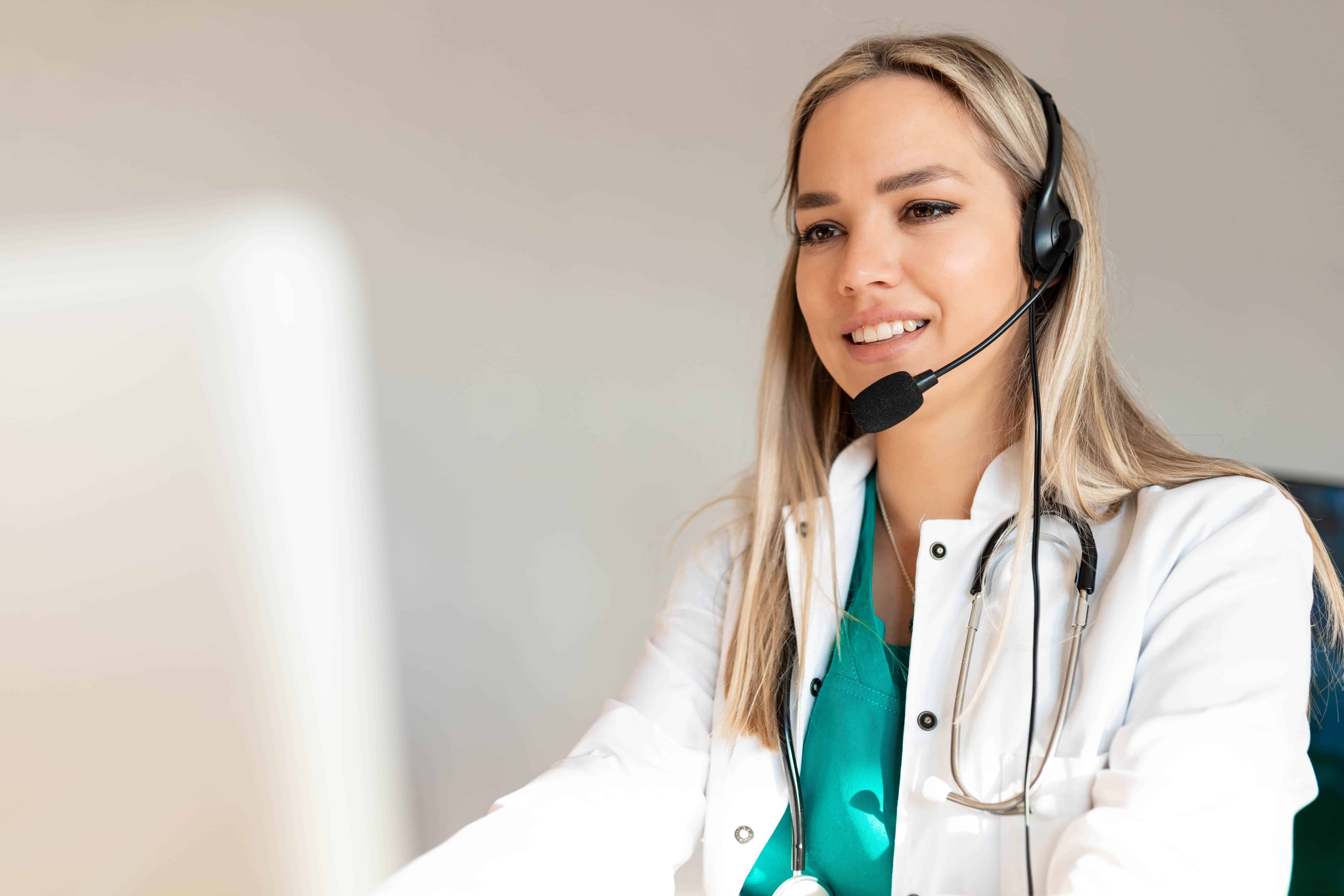 Smiling dispatcher with a headset on