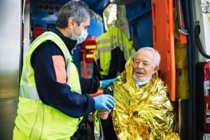 Medic rescues an elderly person with hypothermia