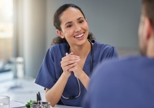 Female medical professional in scrubs